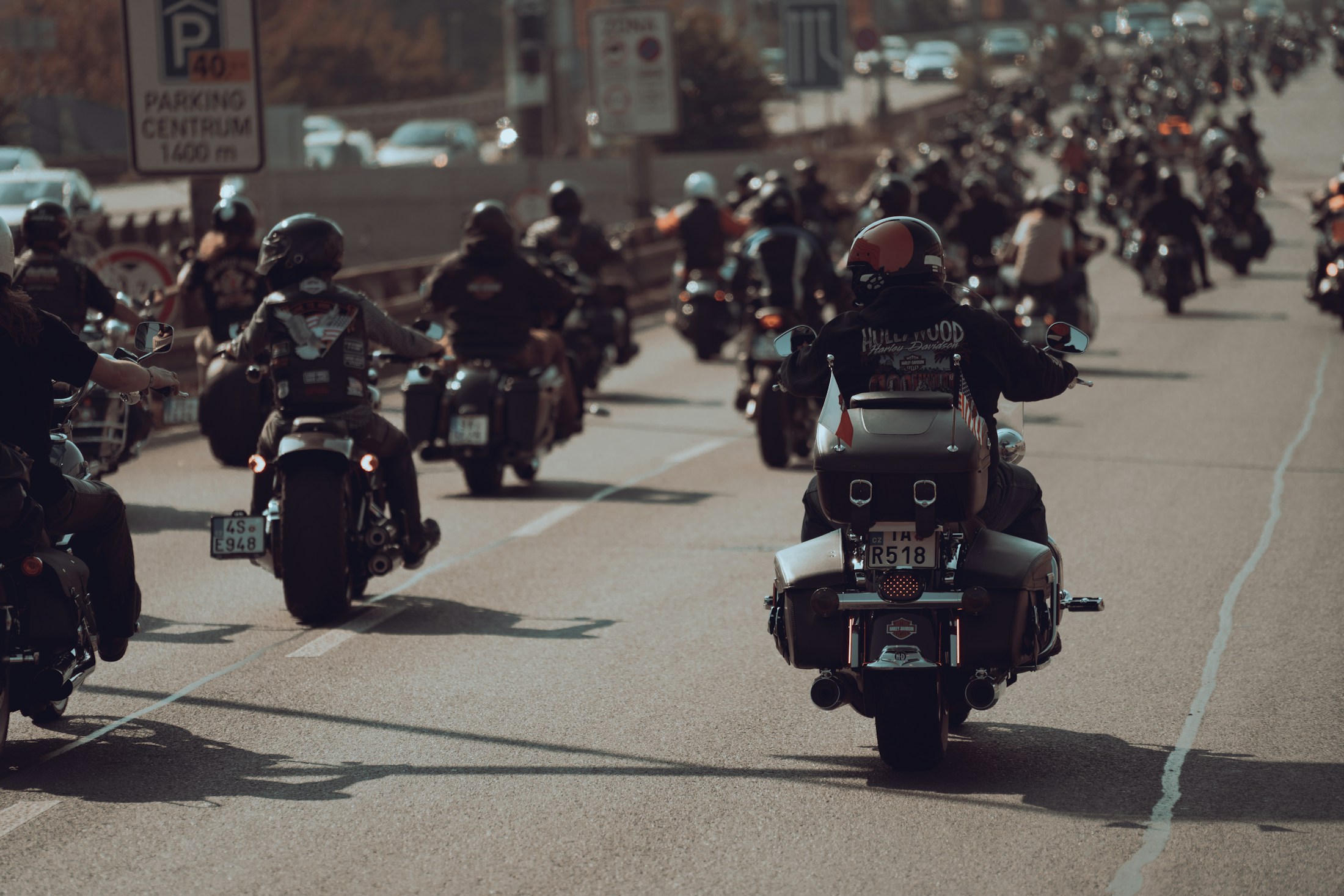A community of motorcyclists riding together through a city